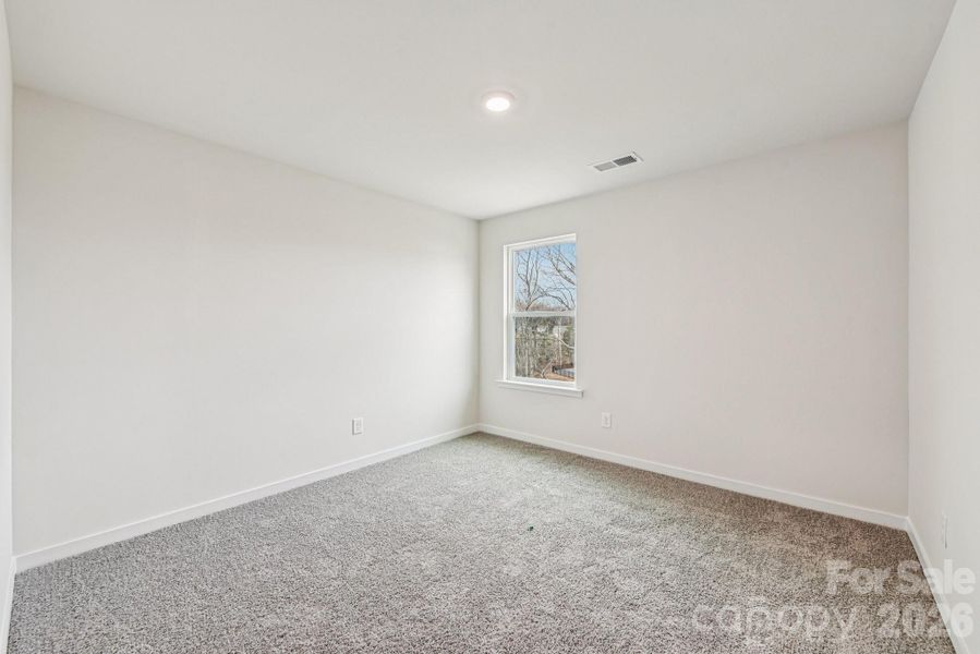 Spacious, unfurnished interior of a new home in Reedy Creek Preserve, Charlotte (Image 20).