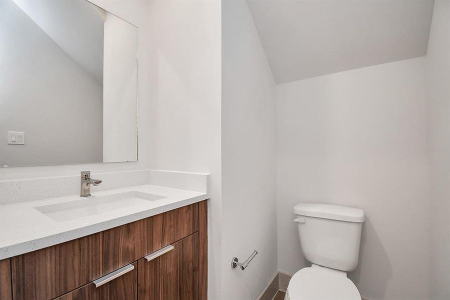 Half Bath on the 1ST Floor with Quartz Countertops