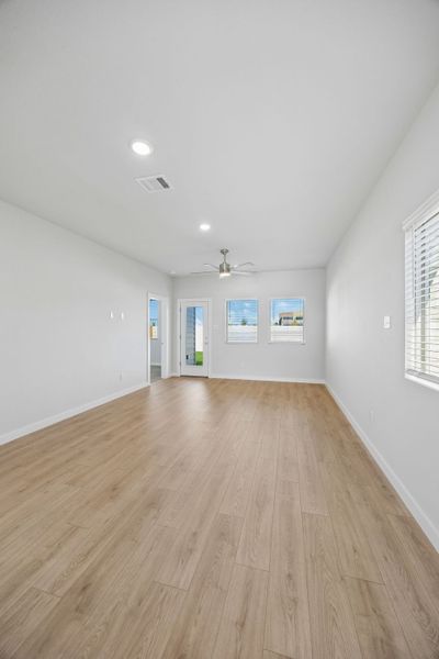 Family Room in the Birch home plan by Trophy Signature Homes – REPRESENTATIVE PHOTO