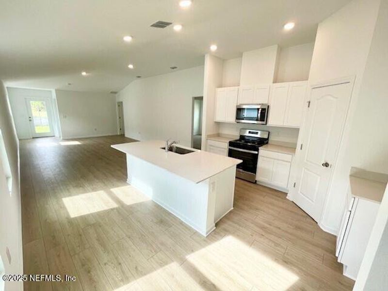 Furnished interior view inside a new home in Grand Reserve, Bunnell (Image 20).