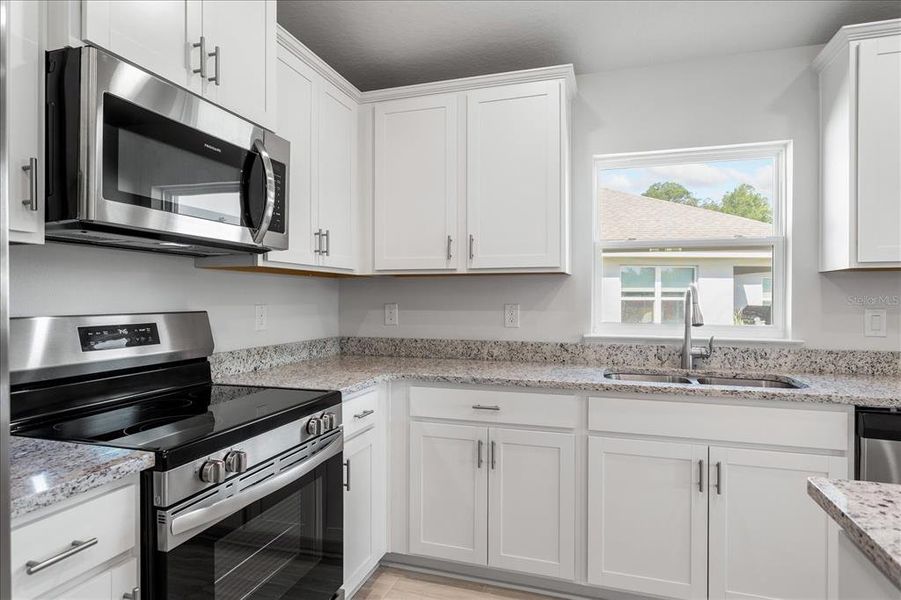 Furnished interior view inside a new home in Abbey Glen, Dade City (Image 8).