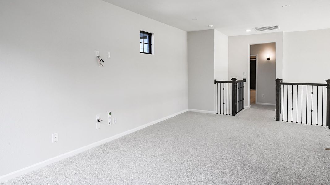 Spacious, unfurnished interior of a new home in 6 Creeks, Kyle (Image 25).