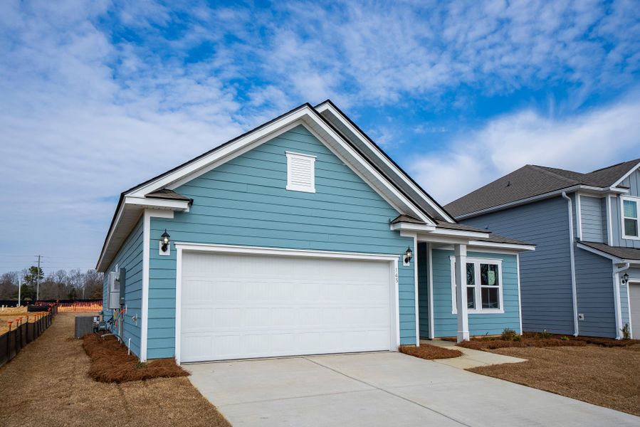 Front exterior of a new home in Monroe Preserve, Chapin, SC, highlighting curb appeal (Image 27).