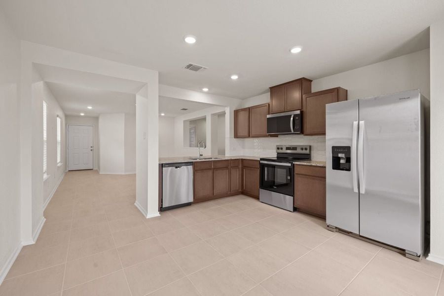 Furnished interior view inside a new home in Sonterra - Cool Water, Jarrell (Image 5).