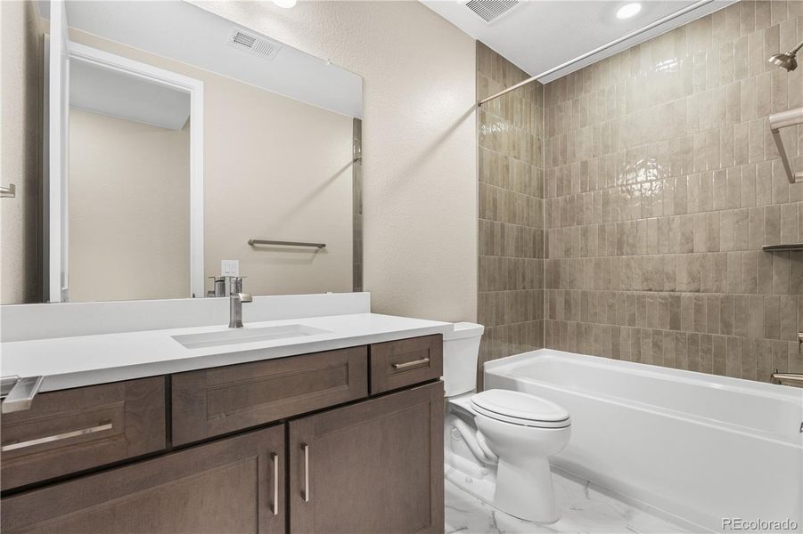 Furnished interior view inside a new home in Autograph at Lyric, Lone Tree (Image 11).