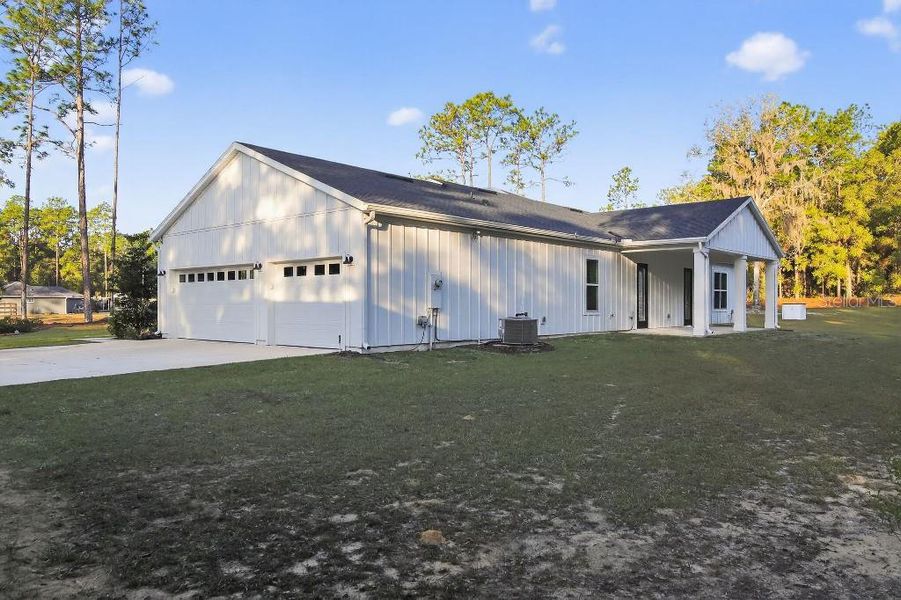 Front exterior of a new home in , Ocala, FL, highlighting curb appeal (Image 21). Front exterior of a new home in , Ocala, FL, highlighting curb appeal (Image 21).