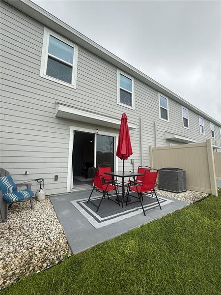 Exterior details and patio area of a home in The Towns at Laurel Commons, Ocala (Image 26).
