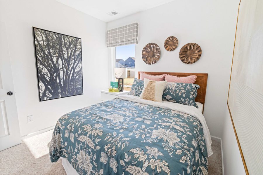 **These photos are examples of a different home with the same floorplan. Interior and exterior may differ.**