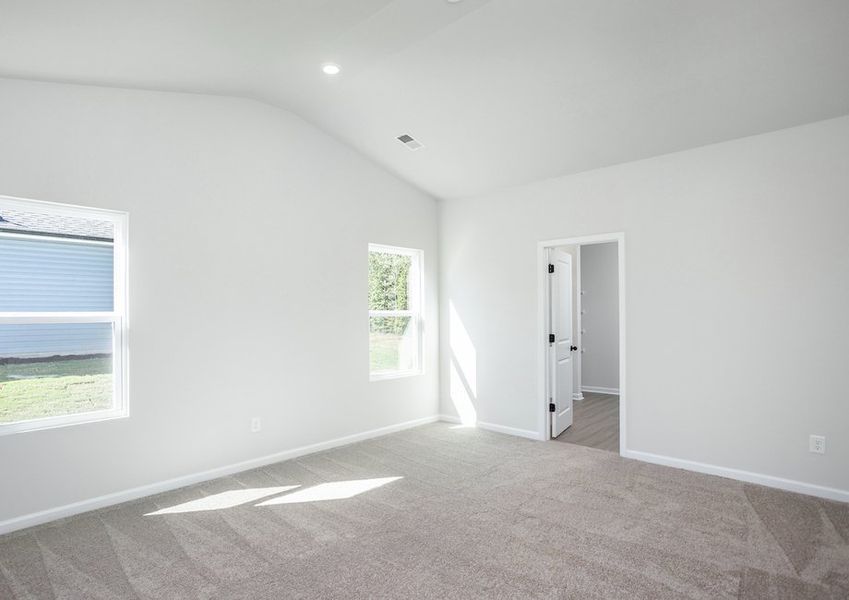 The master bedroom is filled with natural lighting.