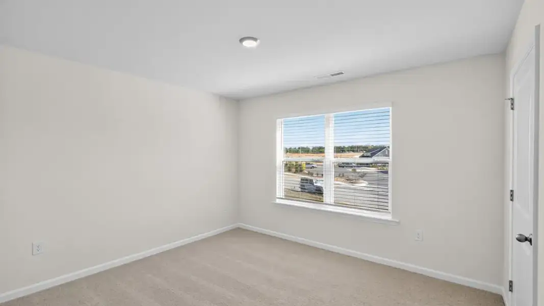 Spacious, unfurnished interior of a new home in Mangum Farms, Stem (Image 26).