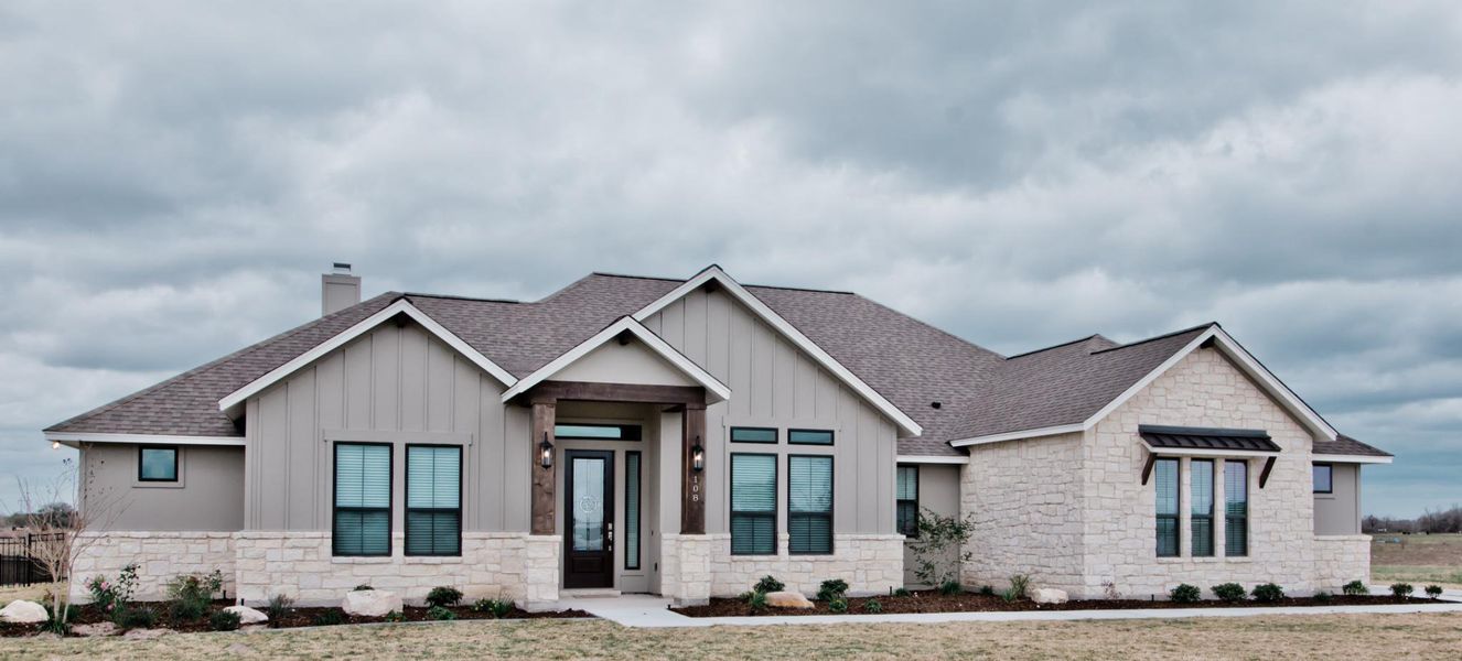 Representative exterior photo of a completed home built from the Burnet by Steve Klein Custom Builder in Escalera Ranch 1833, Victoria, TX (Image 1). Representative exterior photo of a completed home built from the Burnet by Steve Klein Custom Builder in Escalera Ranch 1833, Victoria, TX (Image 1).