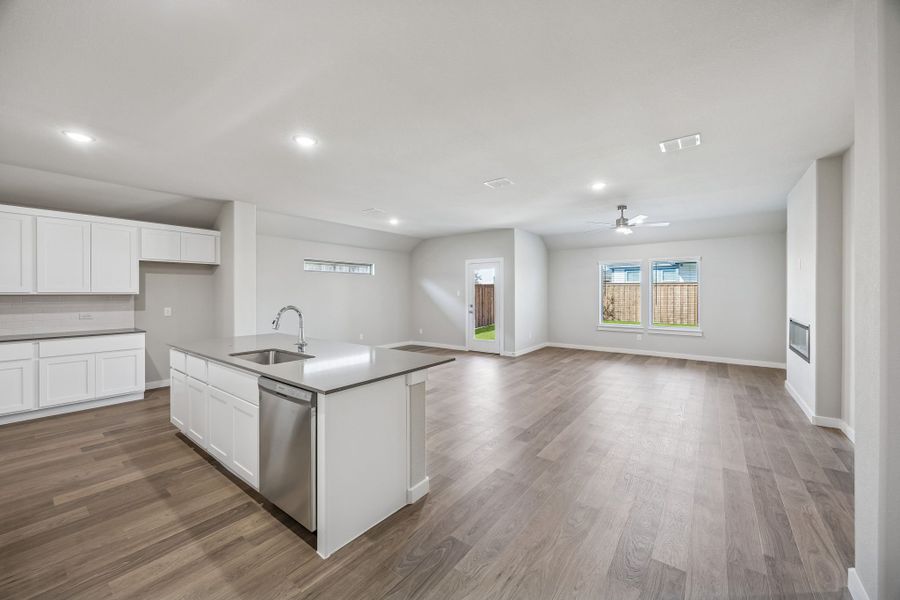 Open Floorplan in the Heisman home plan by Trophy Signature Homes – REPRESENTATIVE PHOTO