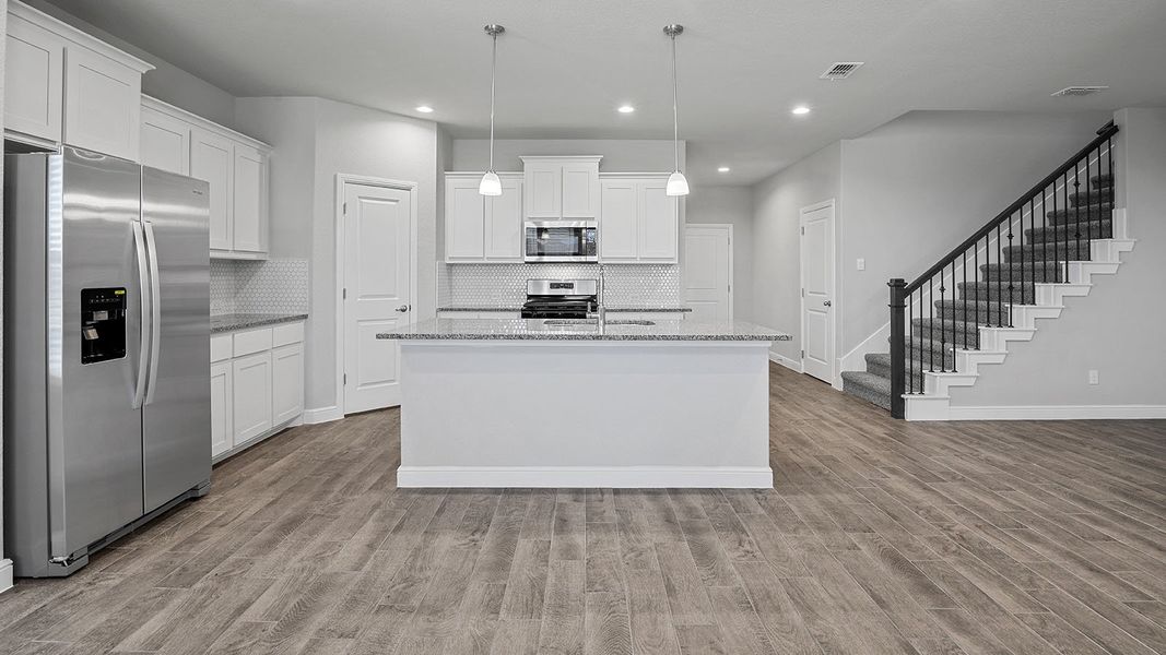 Furnished interior view inside a new home in Bluestem, Rhome (Image 6).