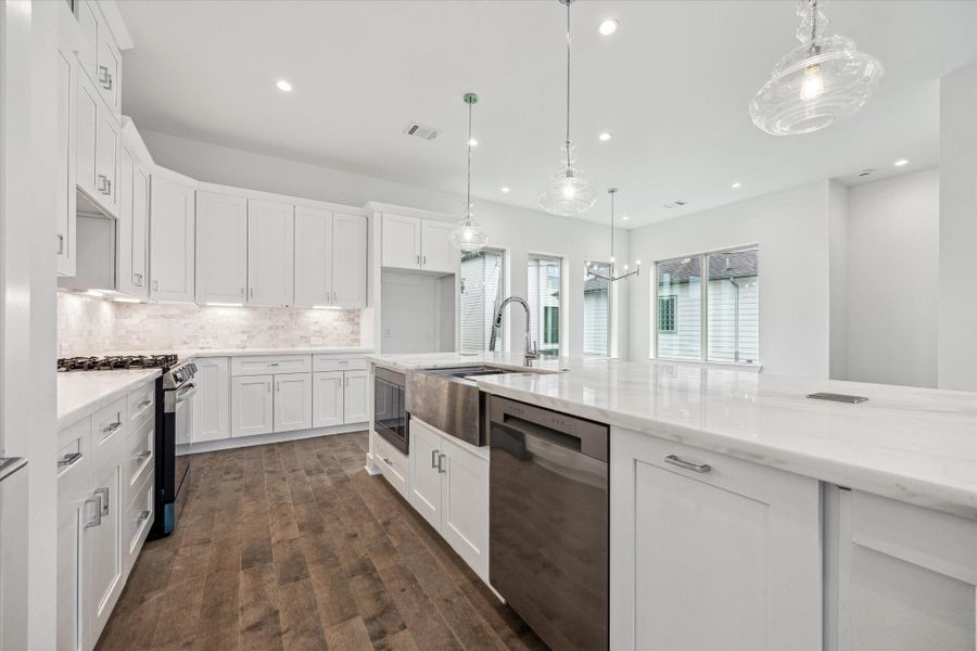 Kitchen Has Gas Cooking * Stainless Steel Appliances * Hidden Trash Containers.