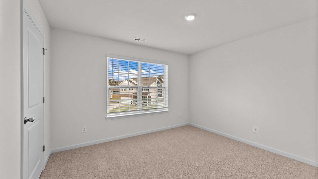 Spacious, unfurnished interior of a new home in Beaver Dam Crossing, Bailey (Image 23).
