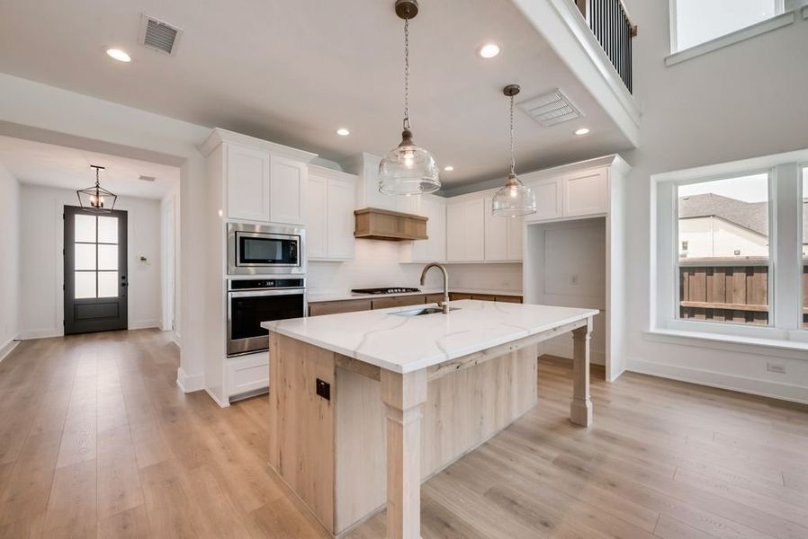 Representative furnished interior of a home built from the Heath - 4452 TP by Shaddock Homes in Tavolo Park, Fort Worth (Image 6).