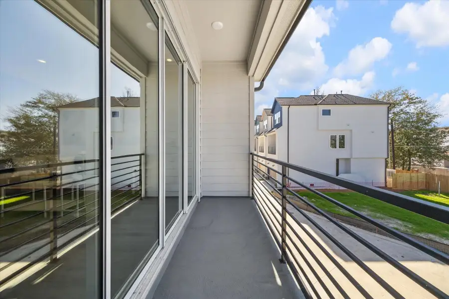 Exterior details and patio area of a home in , Houston (Image 4).