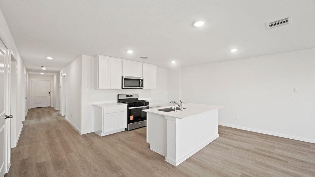 Furnished interior view inside a new home in Westward Pointe, Sealy (Image 6).