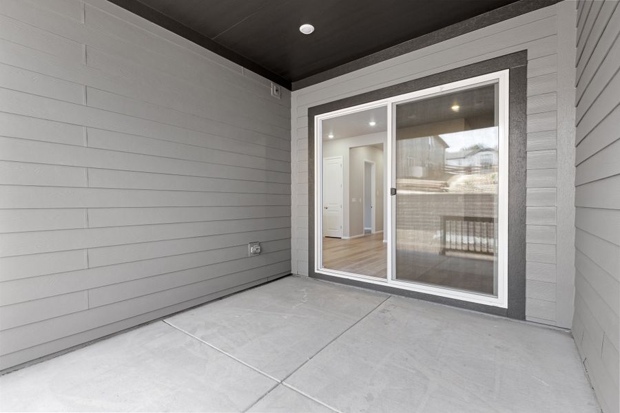 Exterior details and patio area of a home in The Manors Collection at Golden Overlook, Golden (Image 3).
