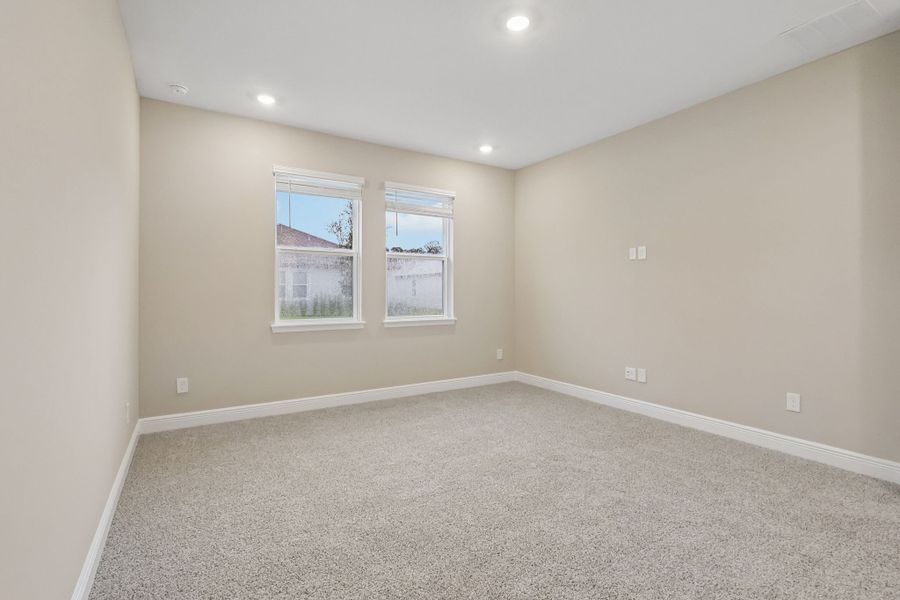 Spacious, unfurnished interior of a new home in Legends Preserve - Signature Series, Daytona Beach (Image 14).