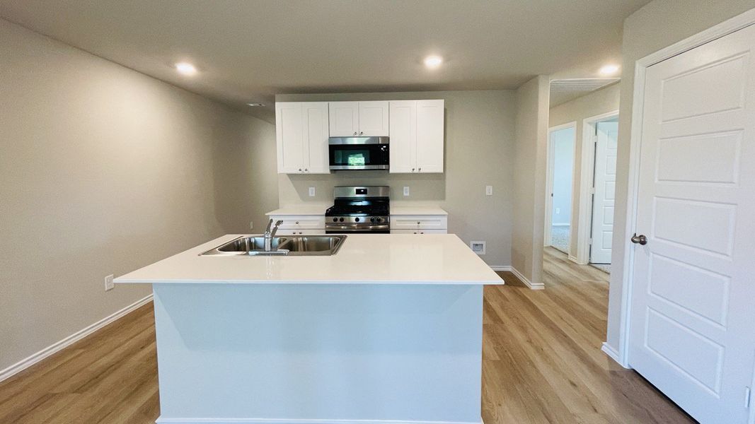 Furnished interior view inside a new home in Sunnycreek, Crowley (Image 4).