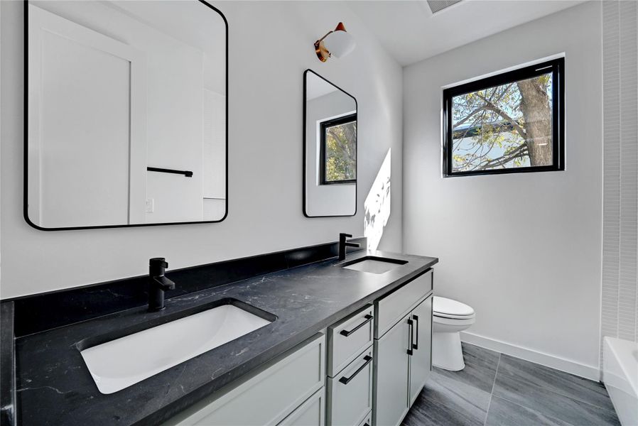 Bathroom with toilet and vanity