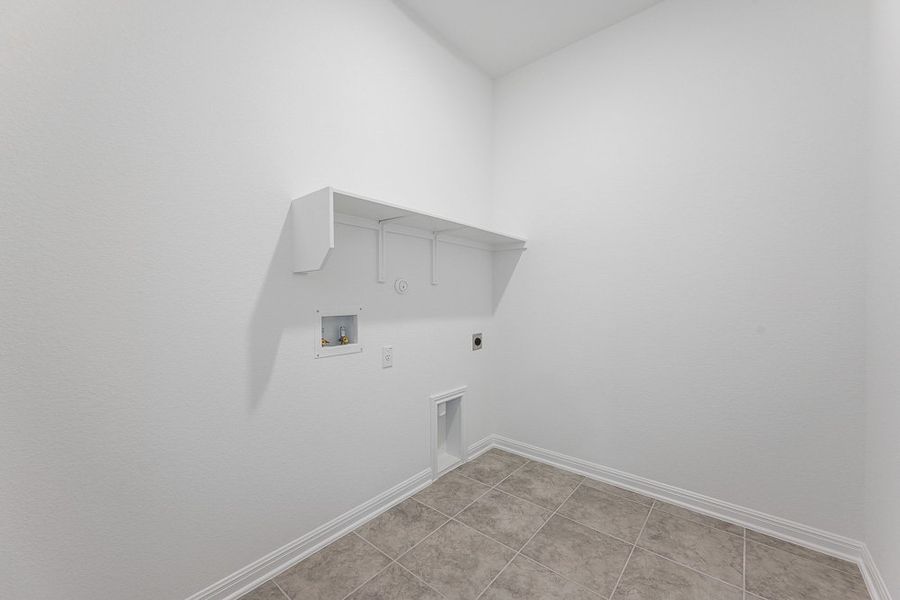 Representative unfurnished interior of a home built from the Wren by Taylor Morrison in Emory Crossing 50s, Hutto (Image 20).