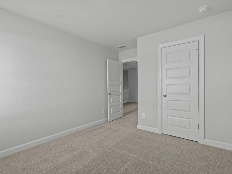 Spacious, unfurnished interior of a new home in Northbrook Village Townes, Taylors (Image 18).