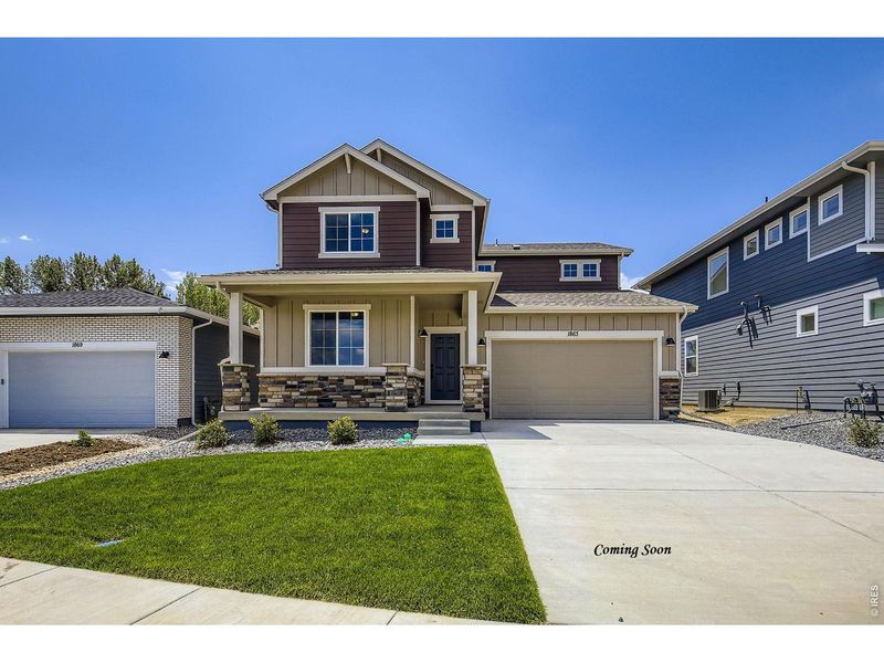 Front exterior of a new home in Country Club Reserve, Fort Collins, CO, highlighting curb appeal (Image 2). Front exterior of a new home in Country Club Reserve, Fort Collins, CO, highlighting curb appeal (Image 2).