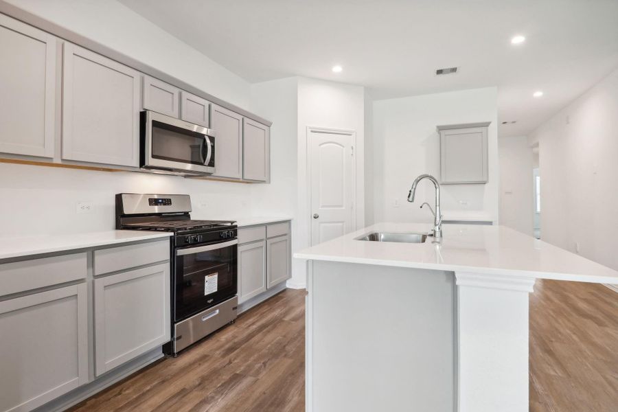 Furnished interior view inside a new home in Grand Pines, Magnolia (Image 5).