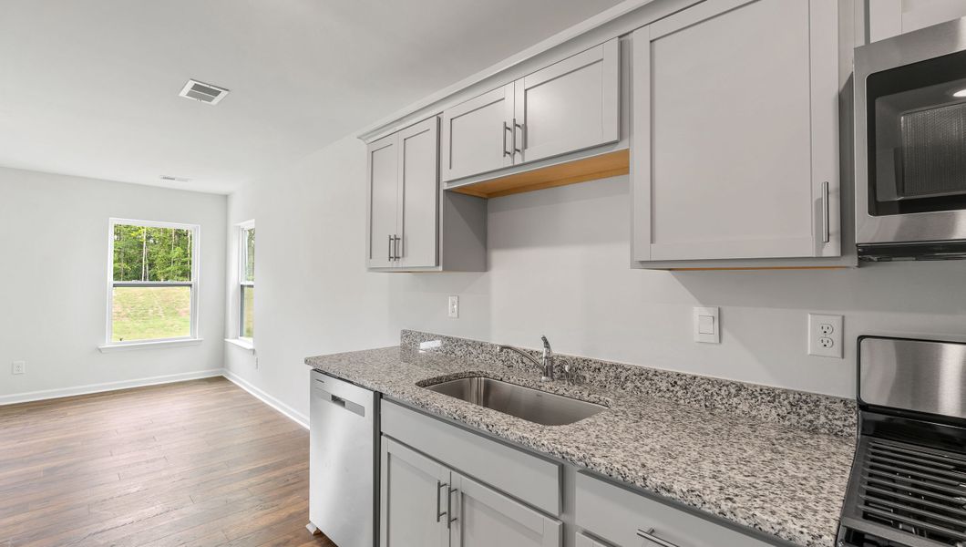 Representative furnished interior of a home built from the SANFORD by D.R. Horton in Stone Creek, Clinton (Image 7).