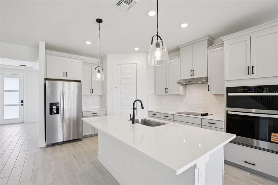 Furnished interior view inside a new home in Magnolia Bay - Reserve Series, Nokomis (Image 8).
