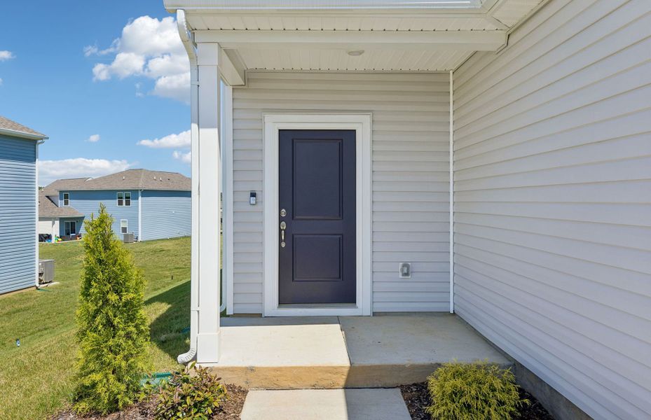 Exterior details and patio area of a home in Highlands of Carter's Station, Columbia (Image 20).