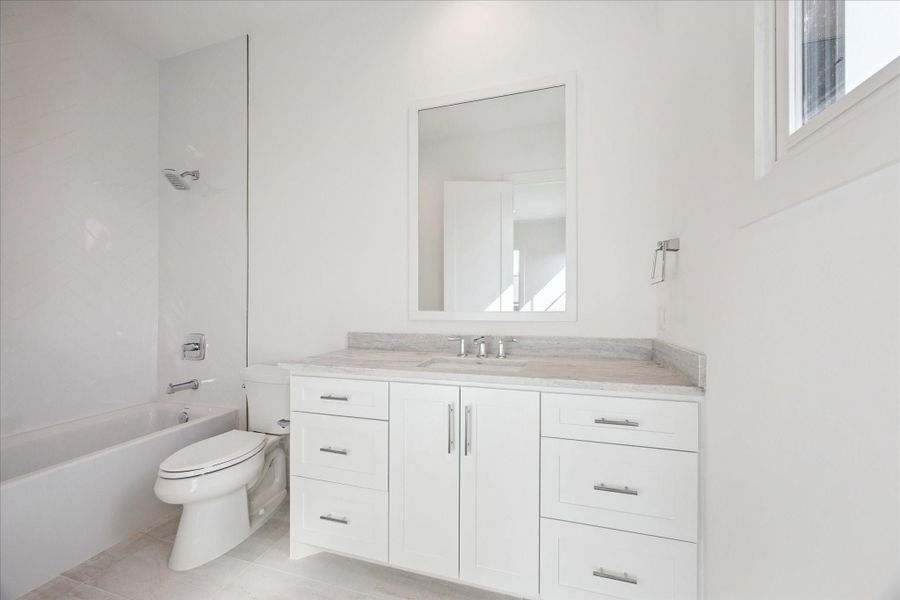 Secondary bathroom 1 with tub/shower combo. Secondary bathroom 1 with tub/shower combo.