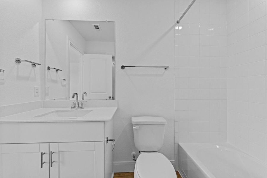 Furnished interior view inside a new home in Railhead, Cedar Creek (Image 12).