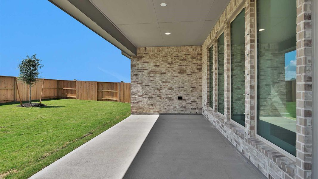 Exterior details and patio area of a home in Meridiana, Manvel (Image 2). Exterior details and patio area of a home in Meridiana, Manvel (Image 2).