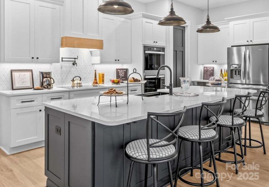 Ten foot long quartz island with storage each side.