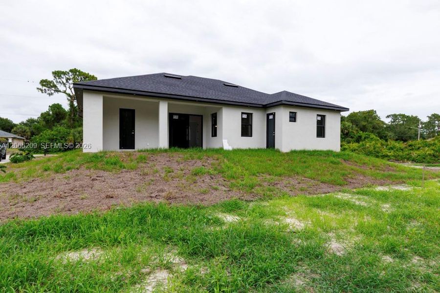Exterior details and patio area of a home in , Lehigh Acres (Image 33).