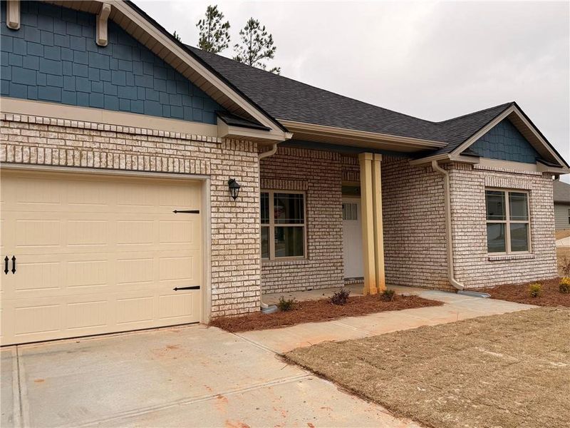 Exterior details and patio area of a home in Magnolia Villas, Cornelia (Image 3). Exterior details and patio area of a home in Magnolia Villas, Cornelia (Image 3).