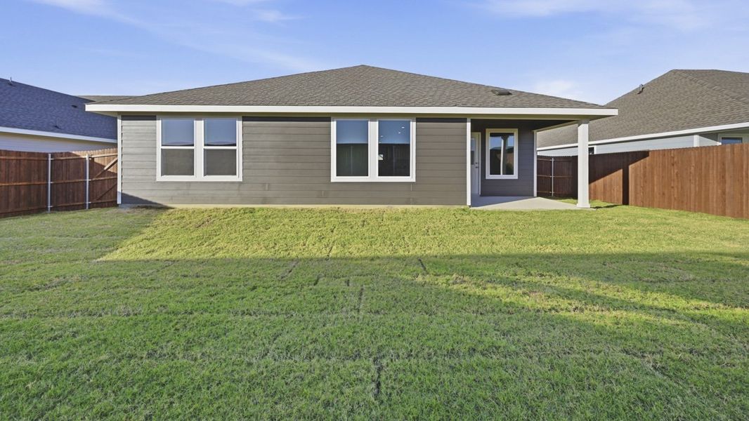 Exterior details and patio area of a home in Windrose, Pilot Point (Image 3).