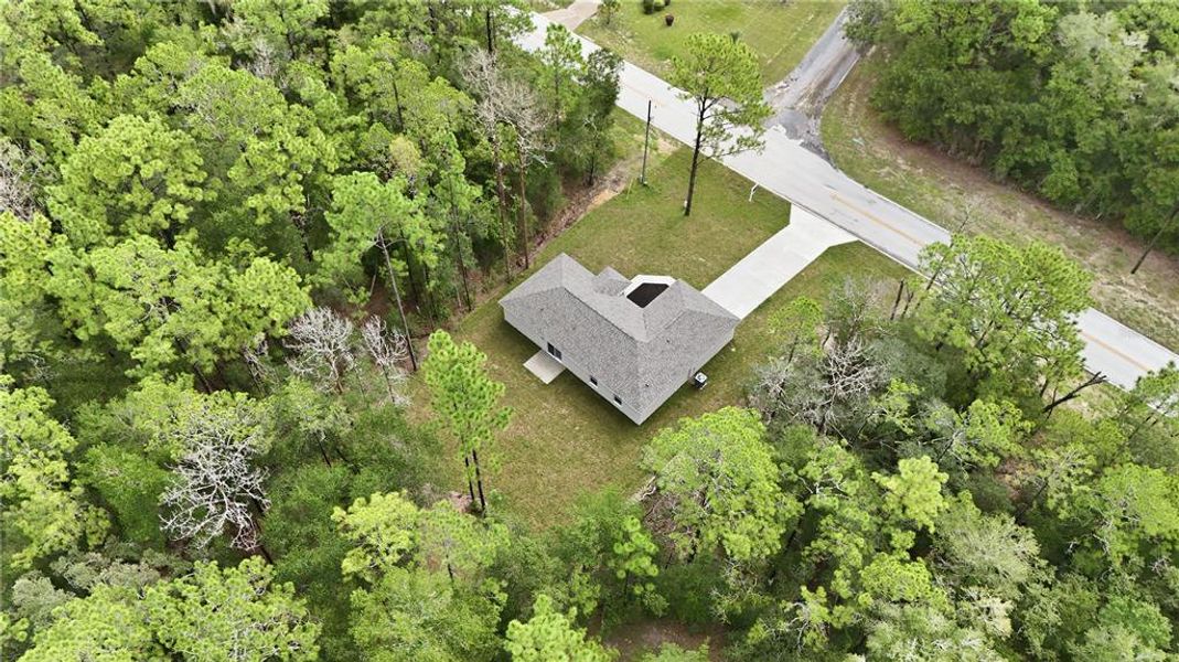 Front exterior of a new home in , Citrus Springs, FL, highlighting curb appeal (Image 24).