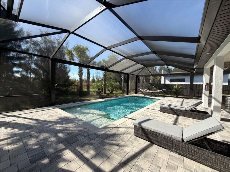 Front exterior of a new home in , Cape Coral, FL, highlighting curb appeal (Image 1).