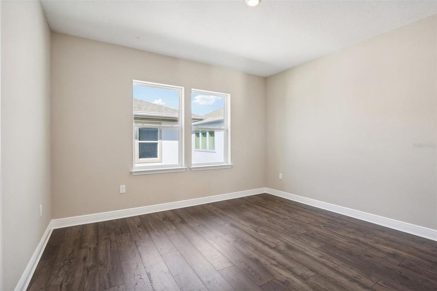 Spacious, unfurnished interior of a new home in Laureate Park, Orlando (Image 47).