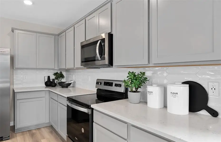 Furnished interior view inside a new home in The Landings at Live Oak Lake, St. Cloud (Image 7).