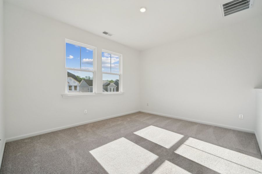 Representative unfurnished interior of a home built from the Madison Premier by Taylor Morrison in Stafford at Langtree, Mooresville (Image 18).