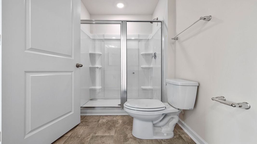 Furnished interior view inside a new home in Bentley Park, Greenwood (Image 13).