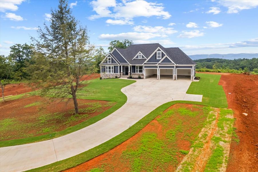 Representative exterior photo of a completed home built from the Converse Elite by Enchanted Homes in Smokey Hills, Campobello, SC (Image 35).