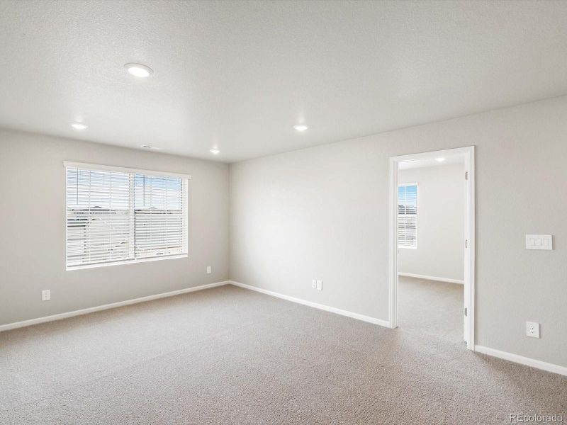 Spacious, unfurnished interior of a new home in Buffalo Highlands: The Canyon Collection, Commerce City (Image 15).