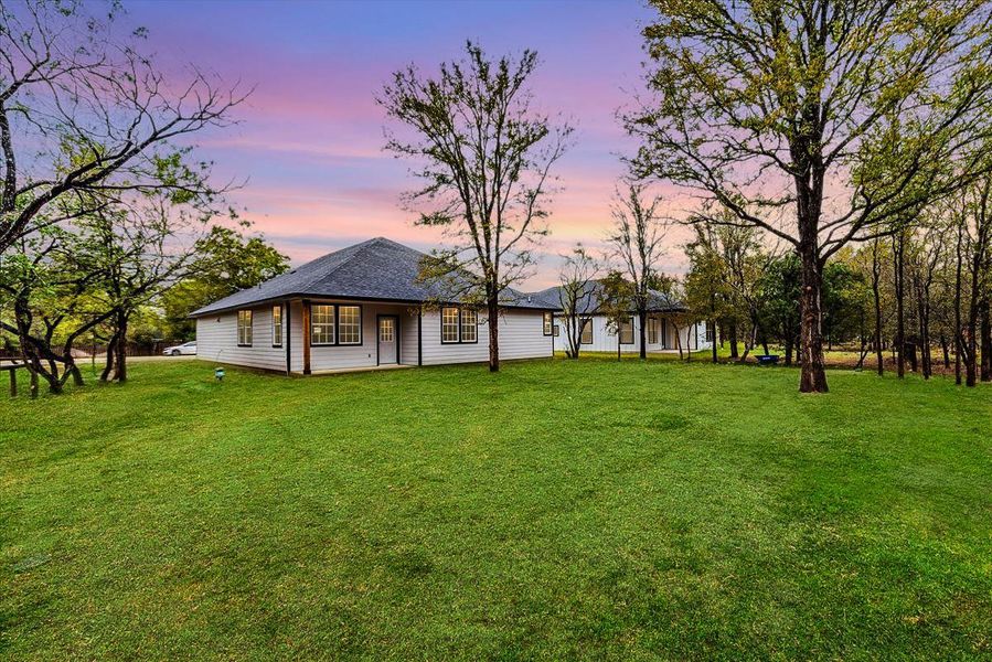 Large Backyard and Covered Patio.  VS grass