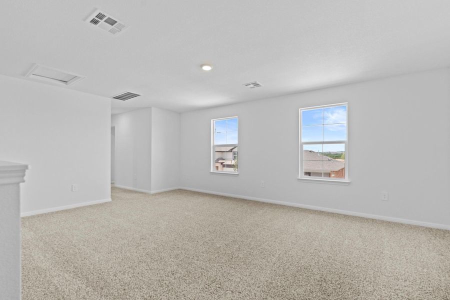 Spacious, unfurnished interior of a new home in Bar W Ranch, Leander (Image 22).